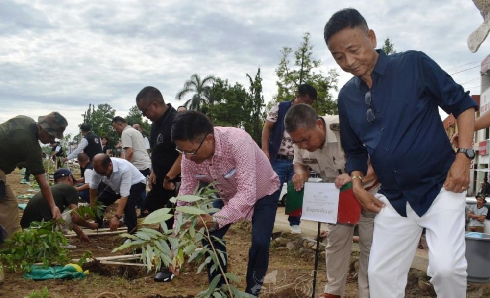 Minister CL John with others during the plantation drive held at the Supermarket area in Dimapur on June 27. (DIPR Photo)
